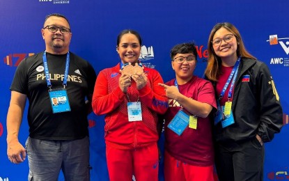 <p><strong>ZAMBOANGA CITY PRIDE.</strong> Kristel Macrohon (2nd from left) snags three bronze medals in the Asian Weightlifting Championships women's 71 kg category at Husnan Sports Park in Zhejiang, China on Tuesday (May 13, 2025). She finished third behind Korean Song Kuk Hyang and Chinese Yang Quixia. <em>(Contributed photo)</em></p>