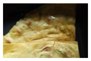 香喷喷的煎饼制作秘籍（手把手教你制作口感松软、口味丰富的煎饼）