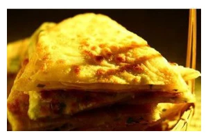 用鱼香调料做出美味烙饼（烙饼的制作方法与技巧）