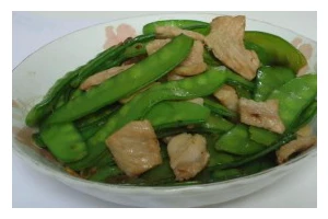 猪肉荷兰豆炒法详解（快手好味，荷兰豆炒肉必备的技巧）