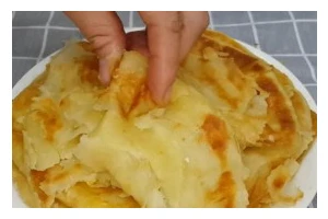 手工制作美味烙饼（从配料到烹饪，轻松做出美味烙饼）