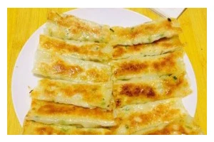 教你如何制作美味的虾皮锅贴（用新鲜虾仁和韭菜制作的传统中式小吃，口感绝佳！）