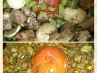 黑暗料理之整个番茄饭集锦,加入排骨鸡蛋的整个番茄饭，提前需要把排骨烧制一下，鸡蛋煮熟去皮，连同蔬菜一起加入，最主要的还是整个番茄必须有。下面的是扁豆焖整个番茄饭。