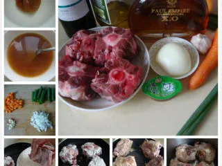 潘普洛纳炖牛尾 ,牛尾洗净，用厨房纸吸干水分，沾面粉用橄榄油煎至金黄，放入高压锅内