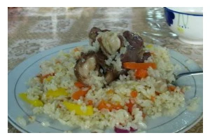 揭秘新疆抓饭人份的制作过程（体验新疆特色美食，品尝美味饭团，发现抓饭制作的奥秘）