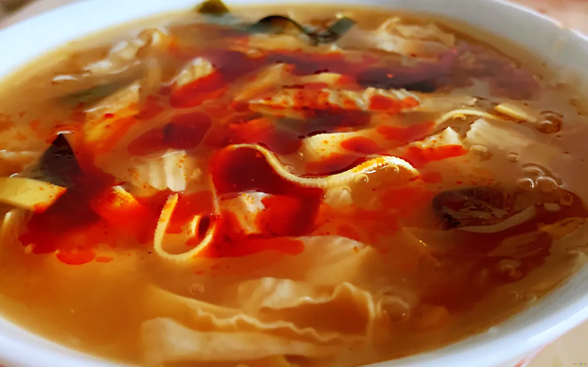 白菜家常做法焖饼视频_白菜焖饼图片_白菜焖饼的家常做法