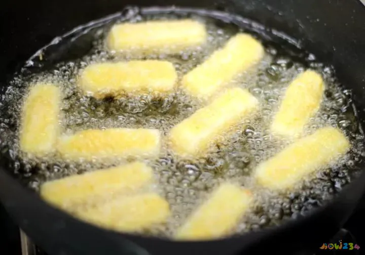 如何做薯条家常做法_炸薯条的家常做法_炸甜红薯条的做法